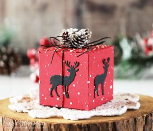 Easy Christmas Boxes by Laurie Schmidlin for Spellbinders using Four Seasons Collection by Lene Lok. Dies used: S7-213 Four Seasons Box Dies, S4-844 Four Seasons Winter Canopy and Elements Dies. #spellbinders #diecutting #christmas