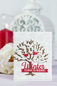 Winter Time Is Here Card by Yana Smakula for Spellbinders. Using Lene Lok Four Seasons collection. S3-308 Seasonal Words, S4-840 Four Seasons Tree, S4-844 Winter Canopy and Elements, S5-338 Wreath Elements. #spellbinders #neverstopmaking #diecutting