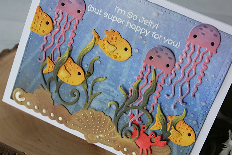 Video Friday | Inking White Die Cuts Ocean Scene Card with Nichol for Spellbinders. Using: S4-671 Sea Life Accents, S3-257 Sea Animals, S4-904 Scored and Pierced Rectangles #spellbinders #diecutting #handmadecard #neverstopmaking