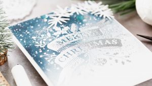 Video: Foiled Watercoloured Christmas Card with Debby Hughes for Spellbinders featuring Merry Christmas Banner Glimmer Hot Foil Plate Holiday 2019